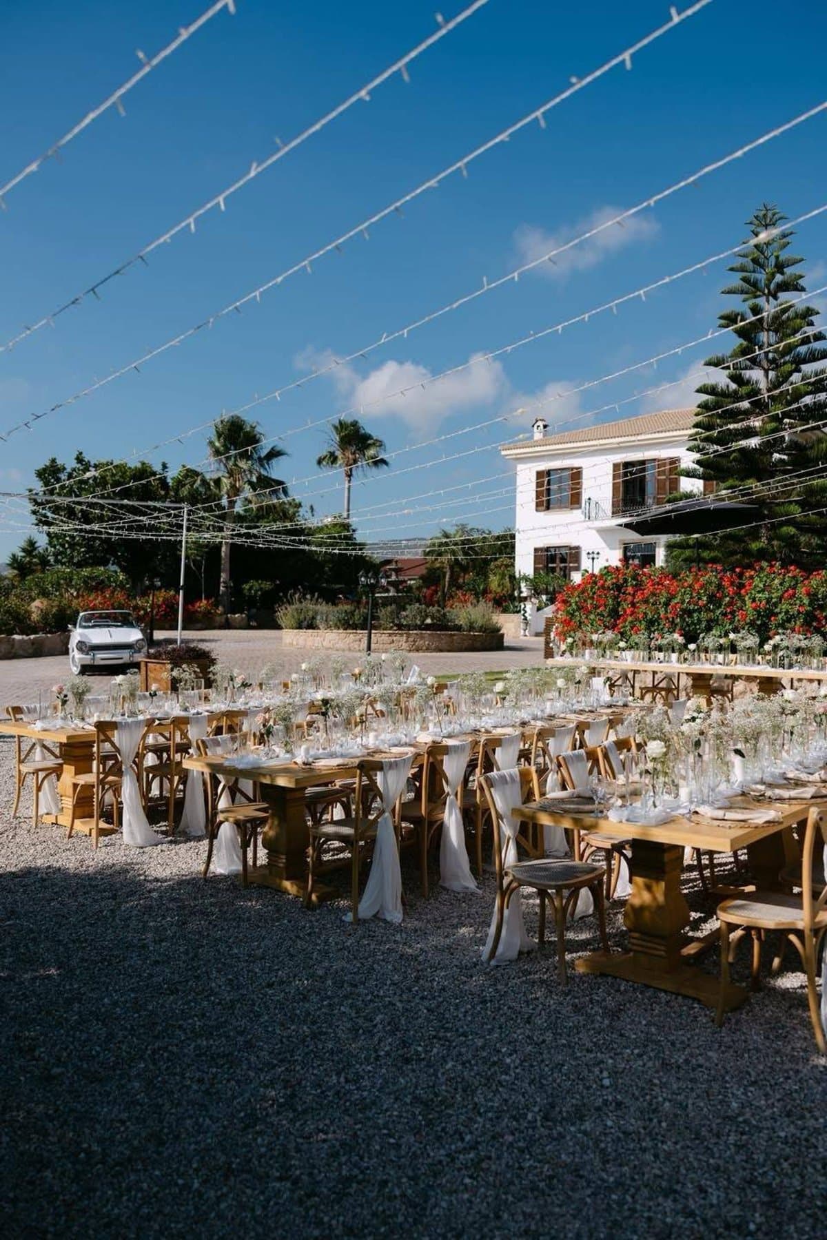 Exclusive-hire villa wedding reception with festoon lights in Cyprus