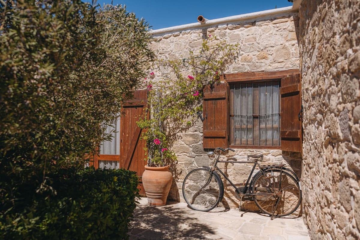 Stone cottage and gardens at Liopetro, Kouklia